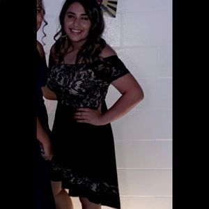 I am selling this beige/black homecoming dress